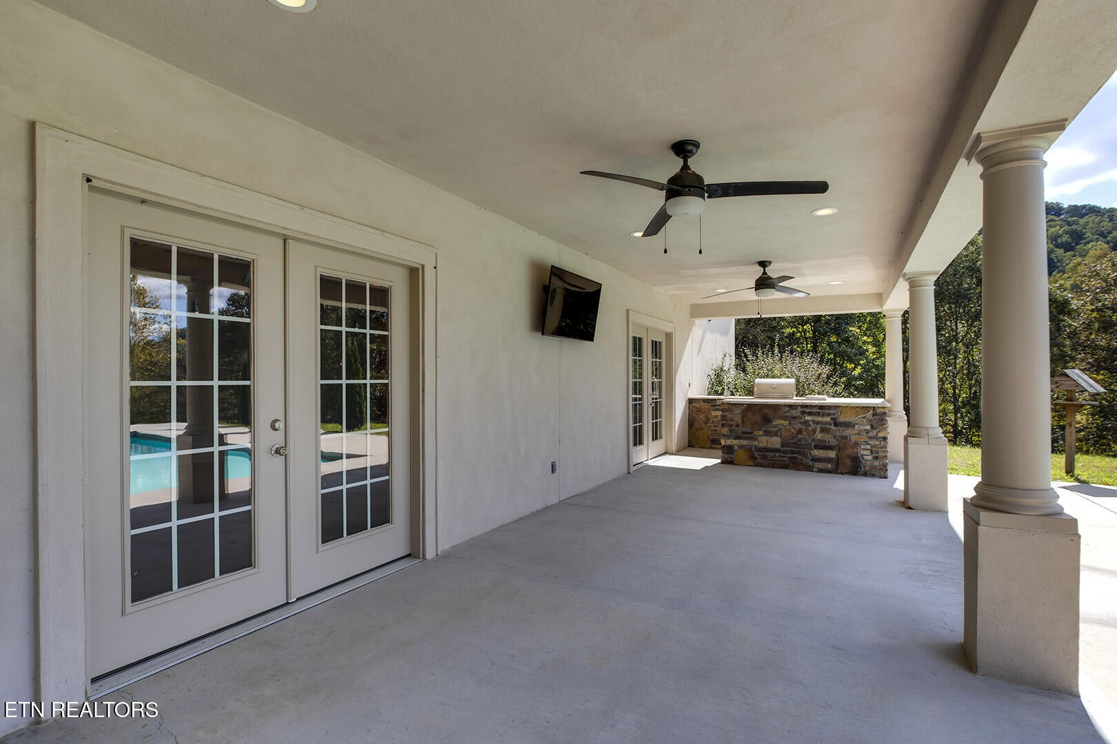 405 Beard Valley Road Maynardville, TN 37807 - Photo 45 of 60 a view of a livingroom with furniture and a ceiling fan
