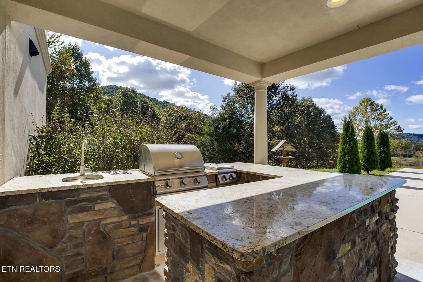 405 Beard Valley Road Maynardville, TN 37807 - Photo 46 of 60 a view of a balcony with table and chairs