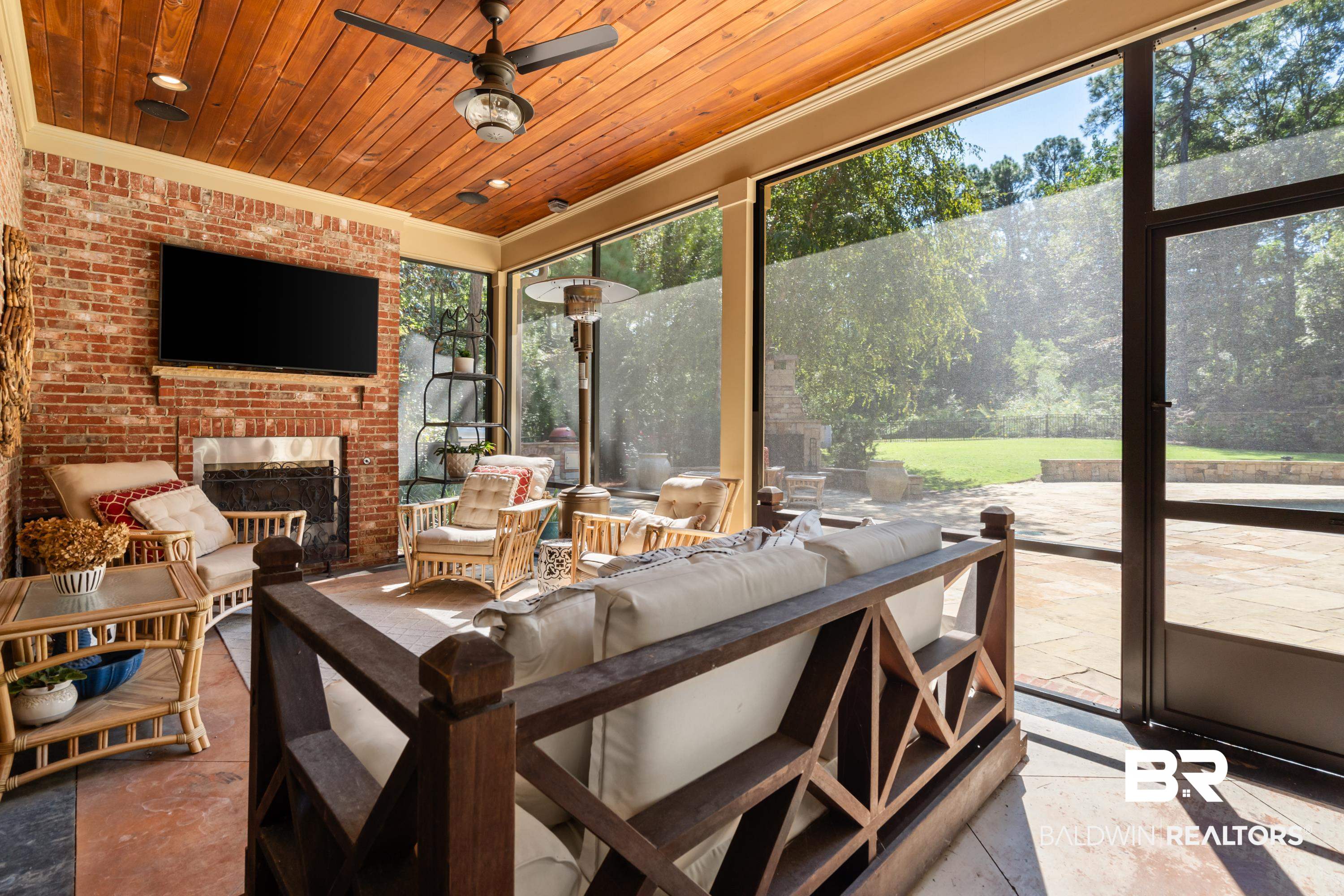 30057 Dolive Ridge Daphne, AL 36527 - Photo 36 of 55 Sunroom featuring wooden ceiling, ceiling fan, a brick fireplace, and plenty of natural light
