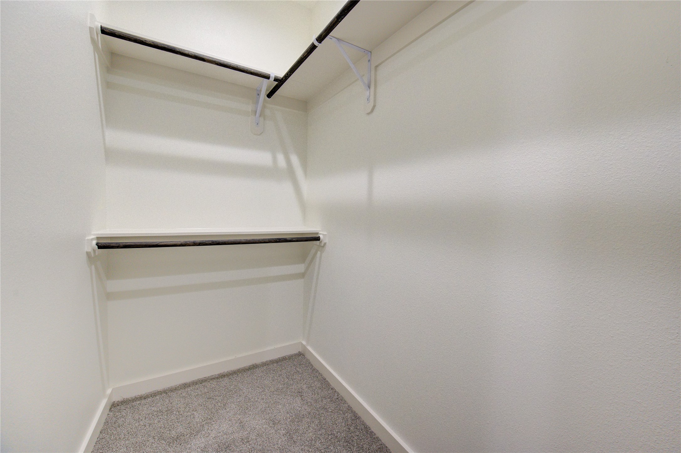 2903 El Fenice Lane Houston, TX 77057 - Photo 17 of 42 a view of an empty walk in closet