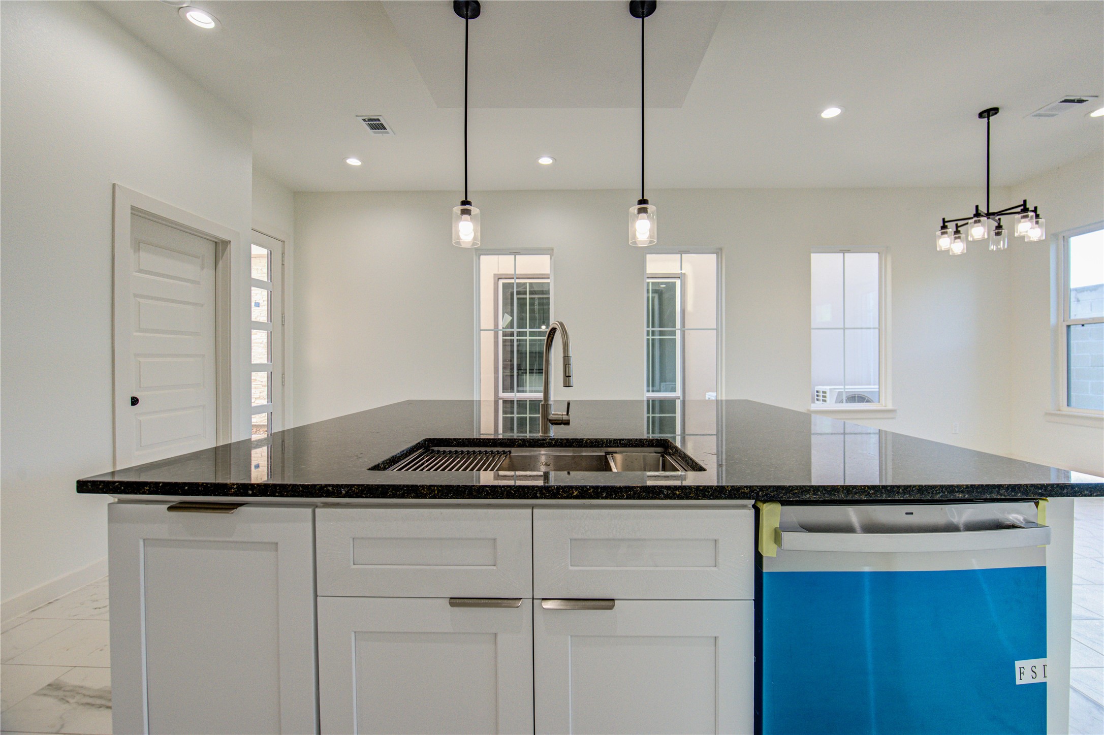 2903 El Fenice Lane Houston, TX 77057 - Photo 34 of 42 a kitchen with a counter space and a window