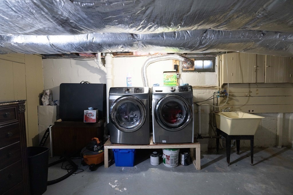 61 Dwight Road Springfield, MA 01108 - Photo 25 of 34 a utility room with dryer washer and stair
