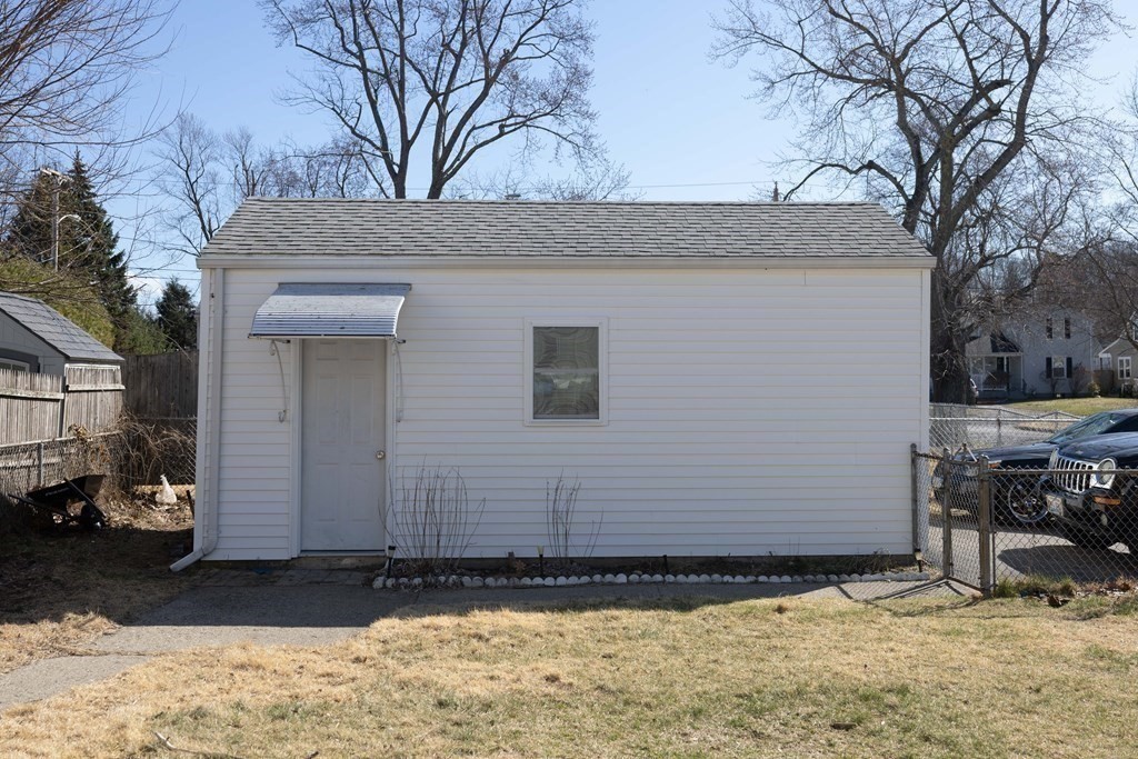 61 Dwight Road Springfield, MA 01108 - Photo 29 of 34 a view of a house with a snow