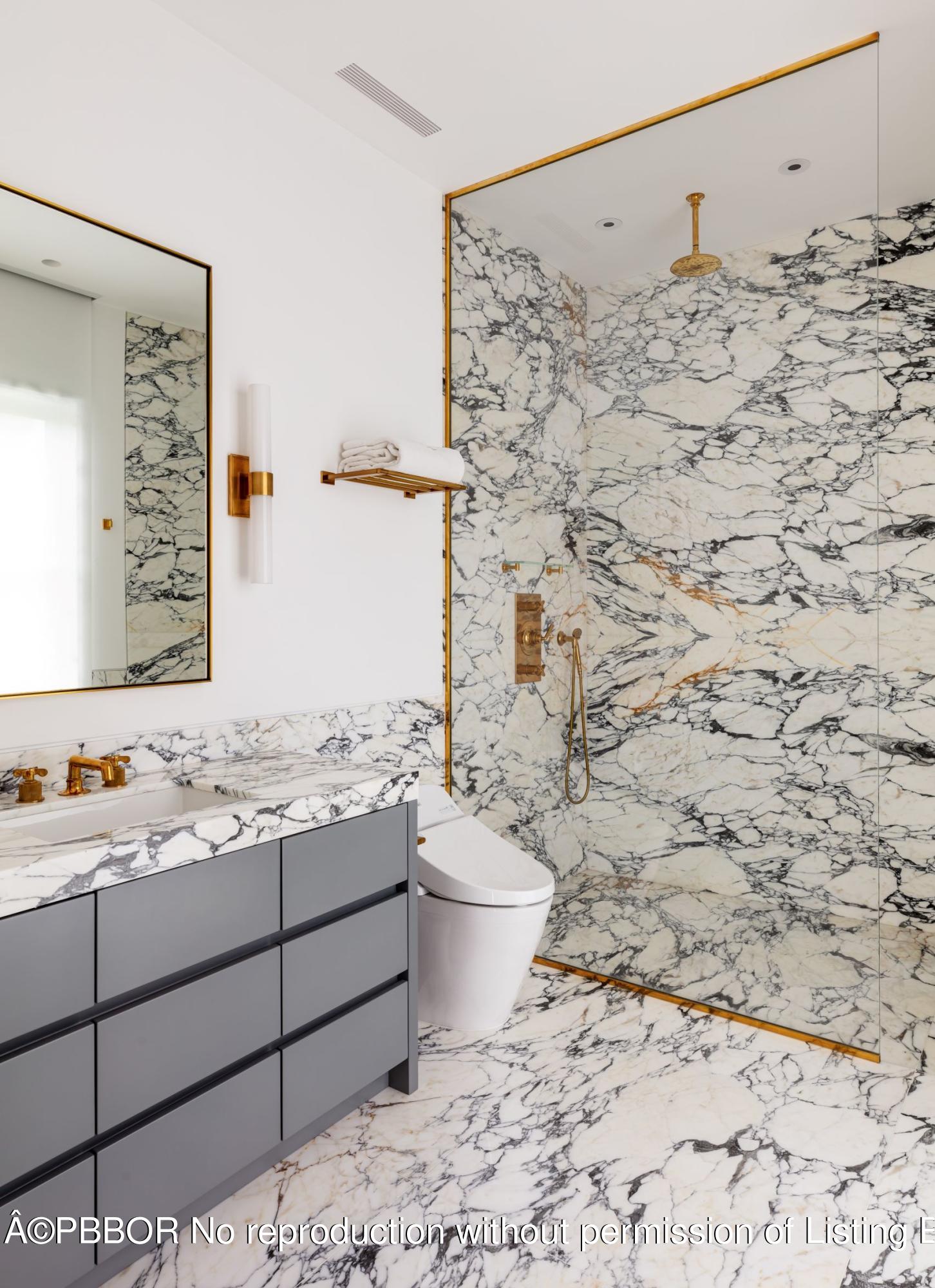 95 Middle Road Palm Beach, FL 33480 - Photo 22 of 32 a bathroom with a sink toilet and shower