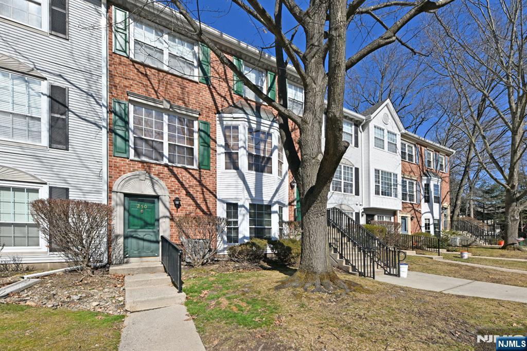 a view of a building with a yard