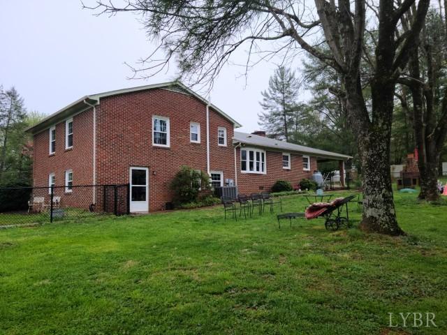 443 Wiggington Road Lynchburg, VA 24501 - Photo 30 of 42 a view of a house with a yard and sitting area