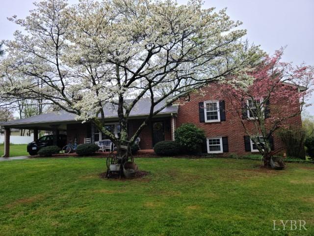 443 Wiggington Road Lynchburg, VA 24501 - Photo 3 of 42 a view of a house with a yard