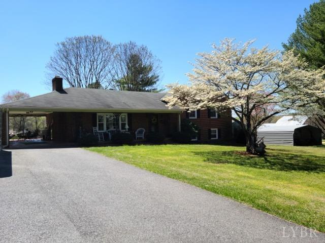 443 Wiggington Road Lynchburg, VA 24501 - Photo 36 of 42 a front view of a house with garden