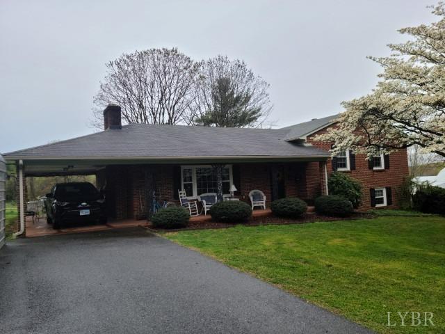 443 Wiggington Road Lynchburg, VA 24501 - Photo 4 of 42 a view of a car parked in front of a house