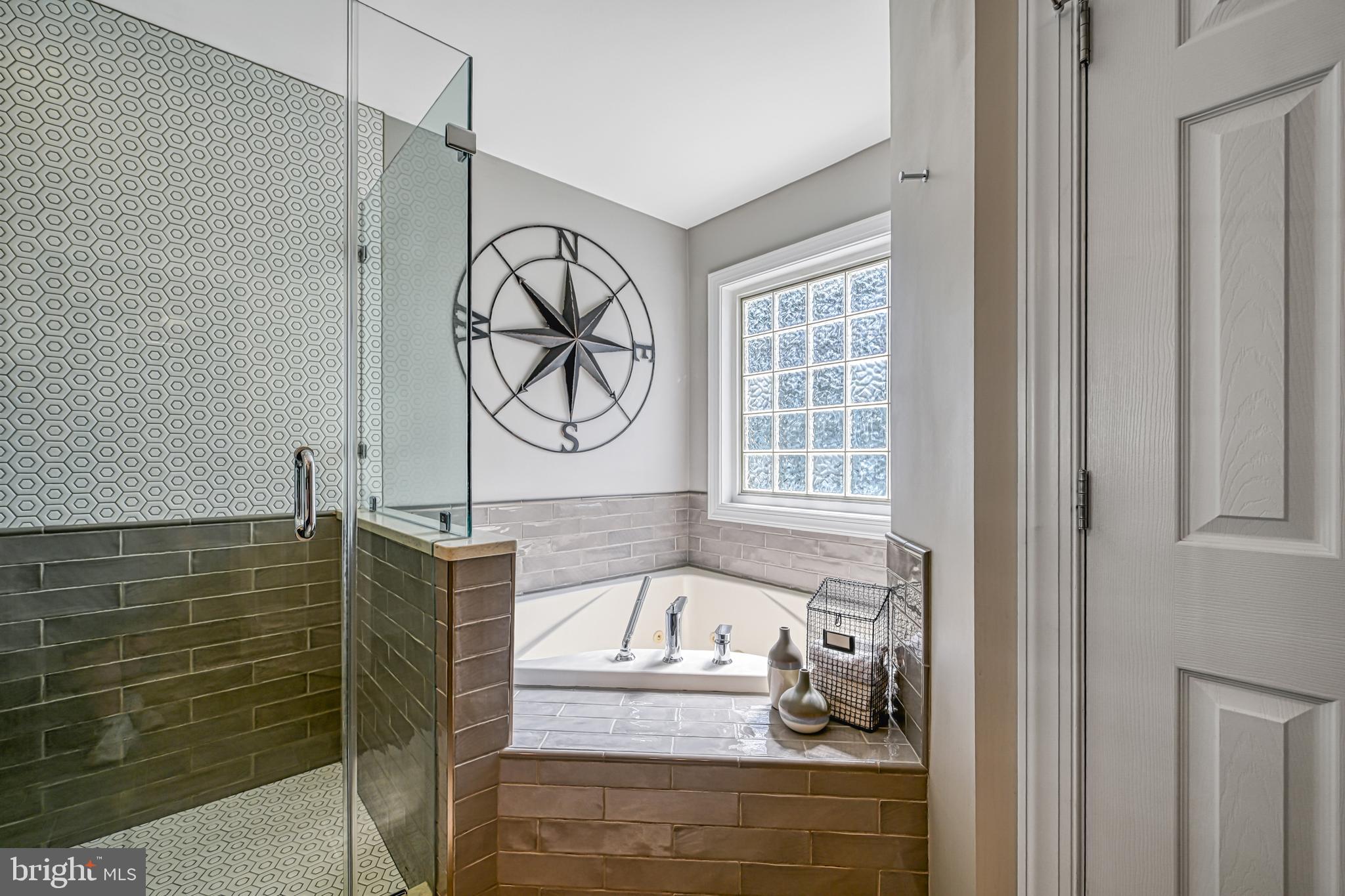 222 Battlefield Road Locust Grove, VA 22508 - Photo 14 of 49 a bathroom with a bathtub and shower