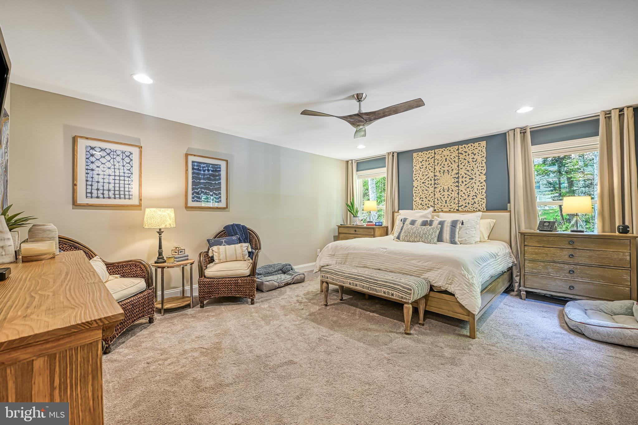 222 Battlefield Road Locust Grove, VA 22508 - Photo 14 of 84 a spacious bedroom with a bed and wooden floor
