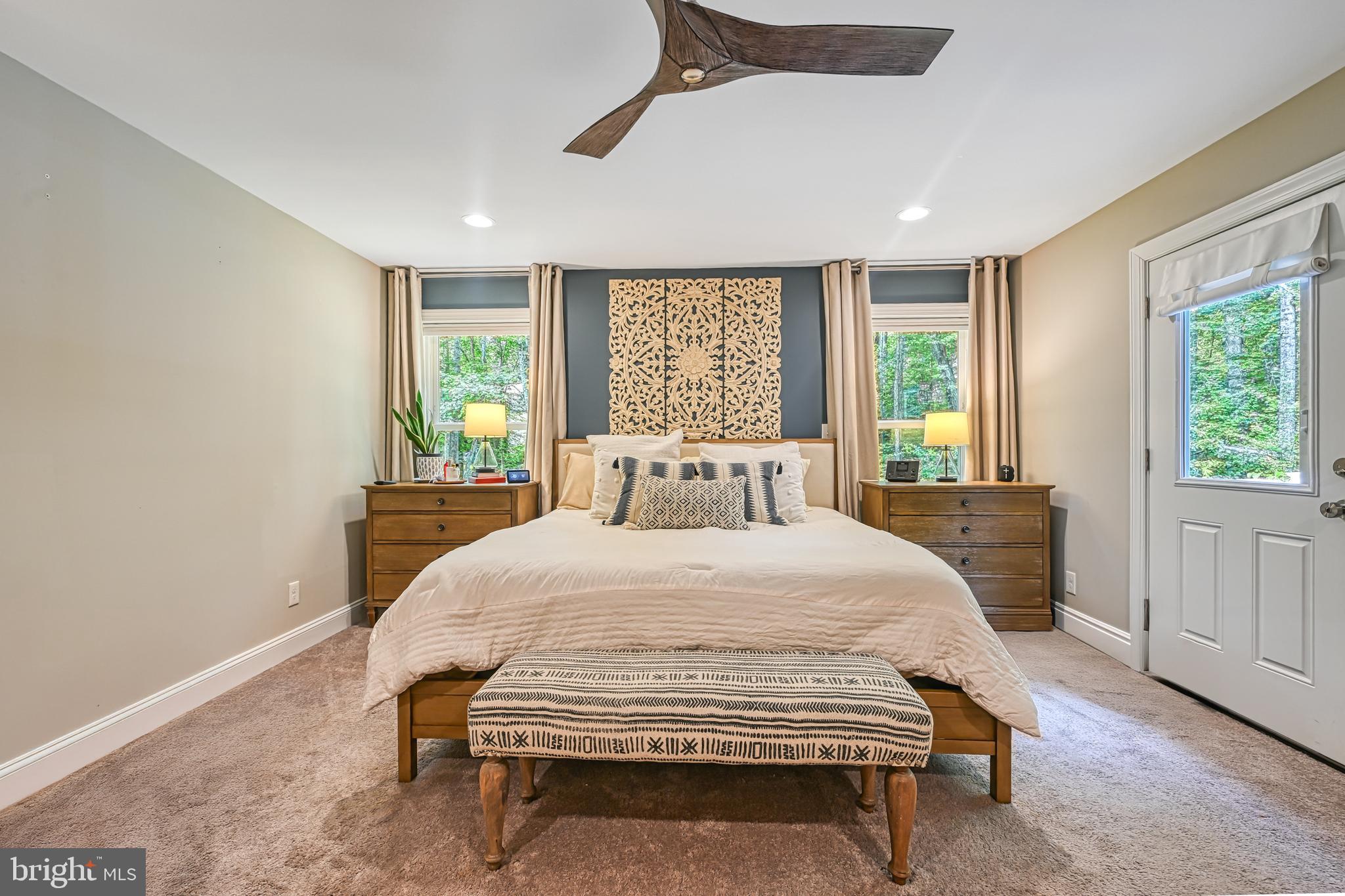 222 Battlefield Road Locust Grove, VA 22508 - Photo 15 of 84 a spacious bedroom with a large bed and a window