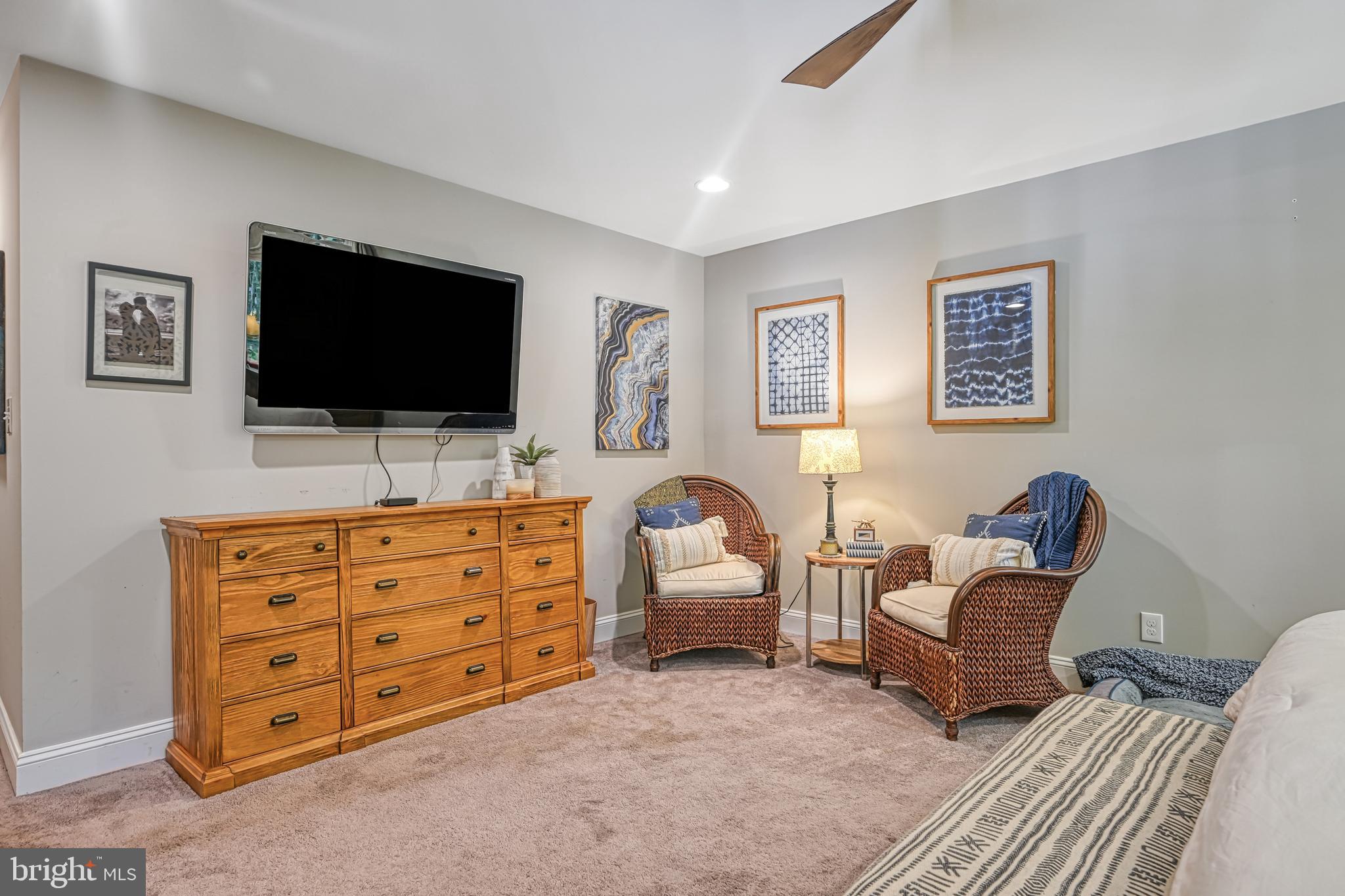 222 Battlefield Road Locust Grove, VA 22508 - Photo 17 of 84 a living room with furniture a flat screen tv and dresser