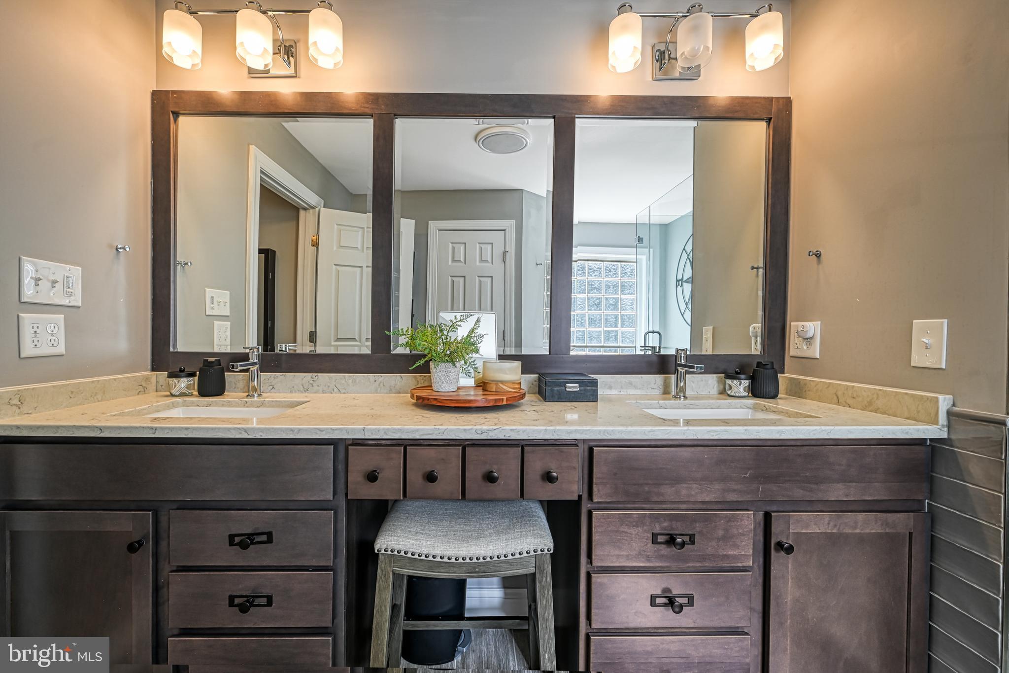 222 Battlefield Road Locust Grove, VA 22508 - Photo 18 of 49 a bathroom with a sink vanity and a mirror