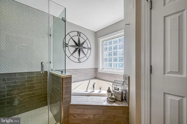 a view of a livingroom with furniture and a window