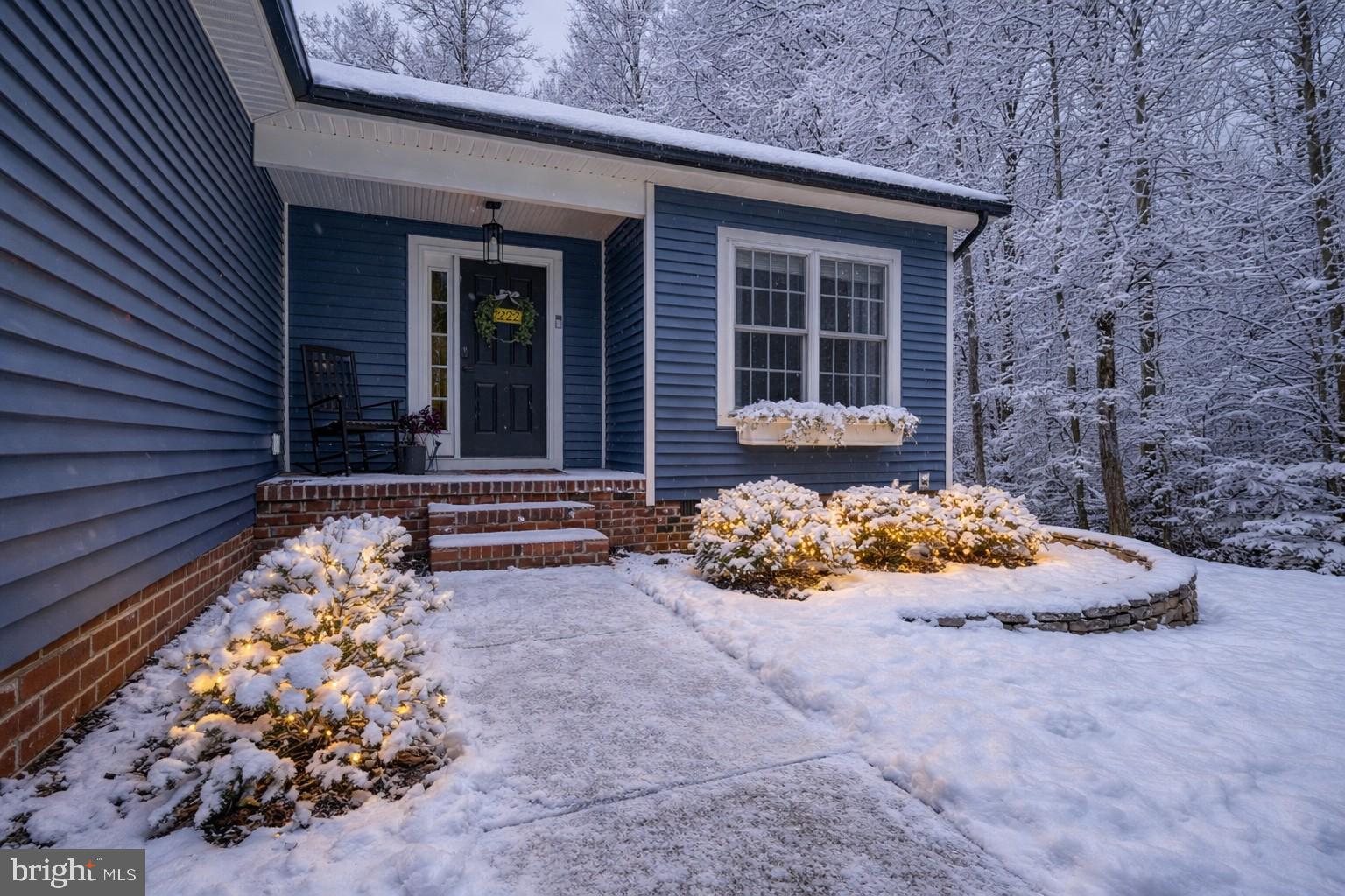 222 Battlefield Road Locust Grove, VA 22508 - Photo 47 of 84 a front view of a house with a garden