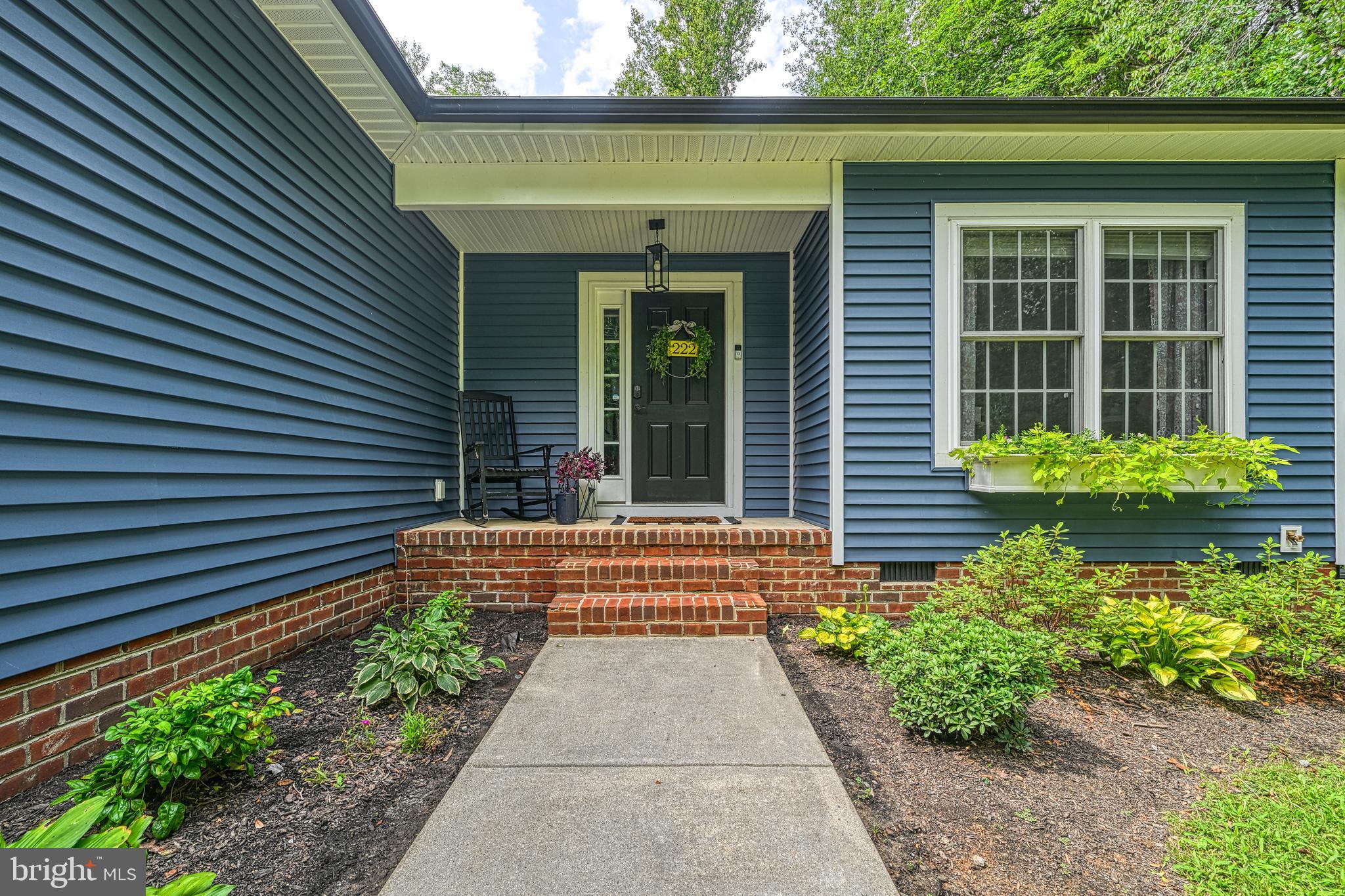 222 Battlefield Road Locust Grove, VA 22508 - Photo 49 of 84 a front view of a house with a yard