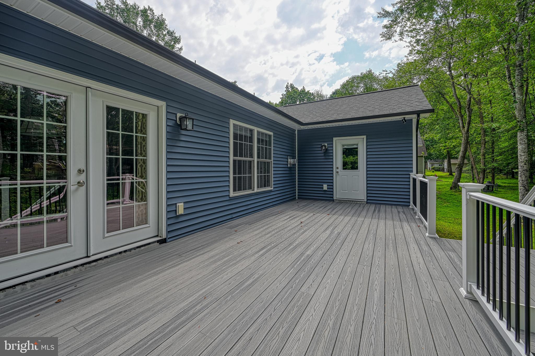 222 Battlefield Road Locust Grove, VA 22508 - Photo 51 of 84 a view of a house with a deck