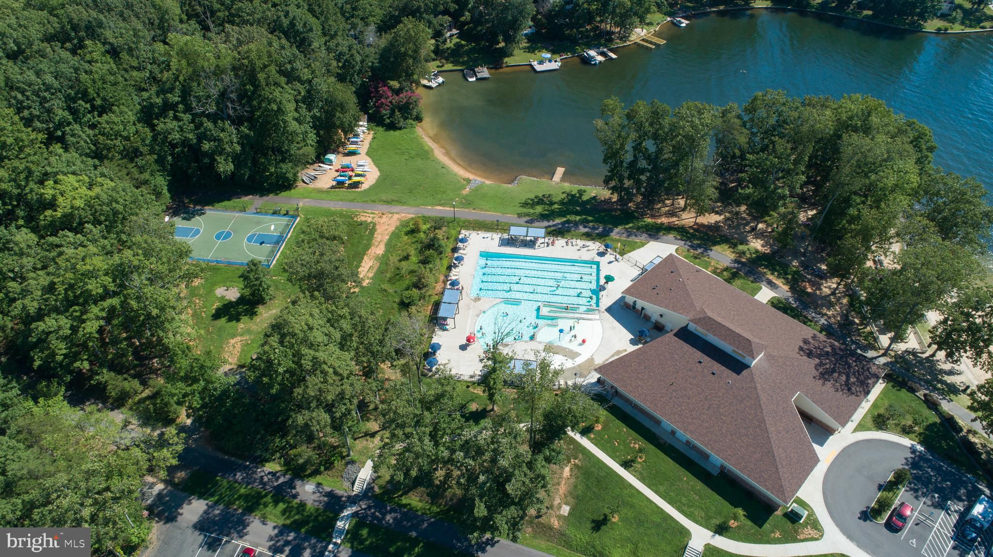 222 Battlefield Road Locust Grove, VA 22508 - Photo 62 of 84 an aerial view of residential house with outdoor space and lake view