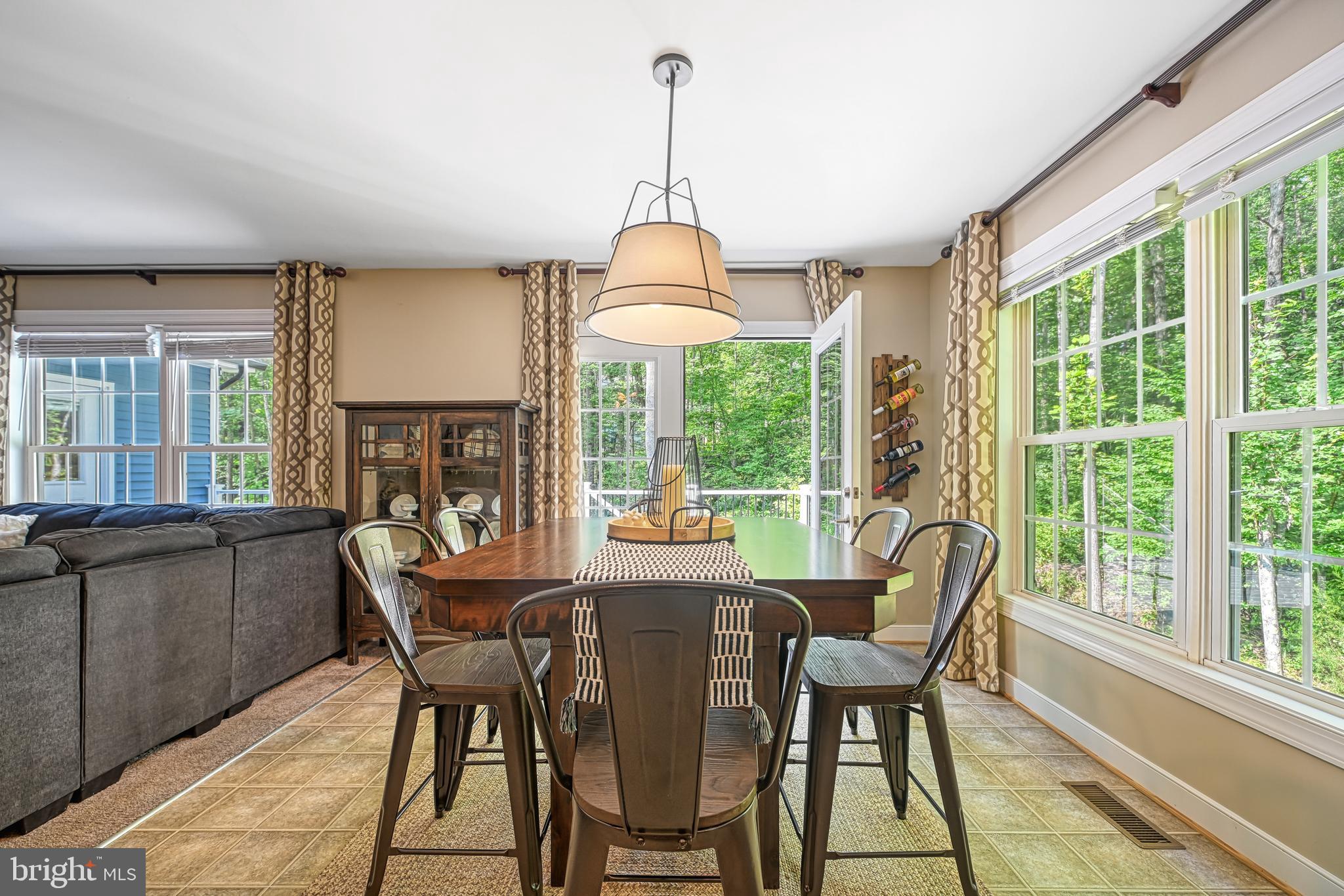 222 Battlefield Road Locust Grove, VA 22508 - Photo 7 of 49 a view of a dining room with furniture window and outside view