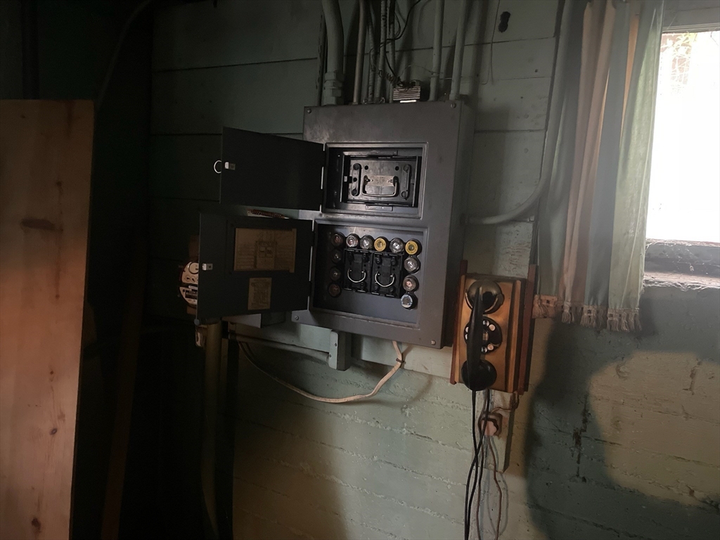 27 Greycliff Road Boston, MA 02135 - Photo 8 of 11 a close view of water heater room