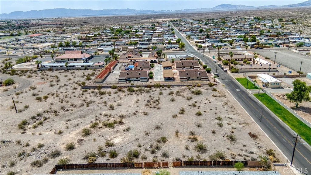 0 Coronado Street Needles, CA 92363 - Photo 19 of 22 an aerial view of residential houses with outdoor space
