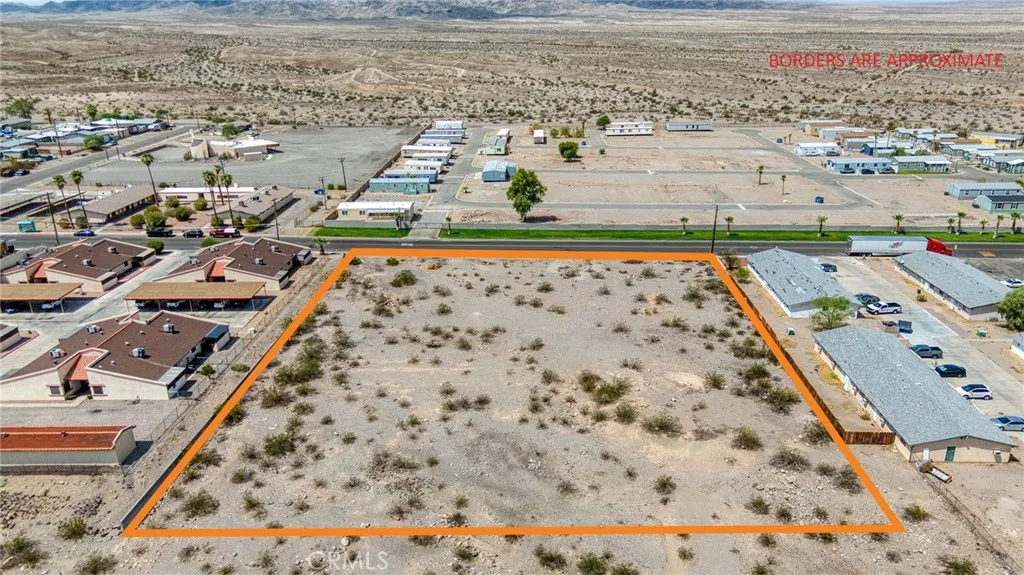 0 Coronado Street Needles, CA 92363 - Photo 2 of 22 an aerial view of residential houses with outdoor space