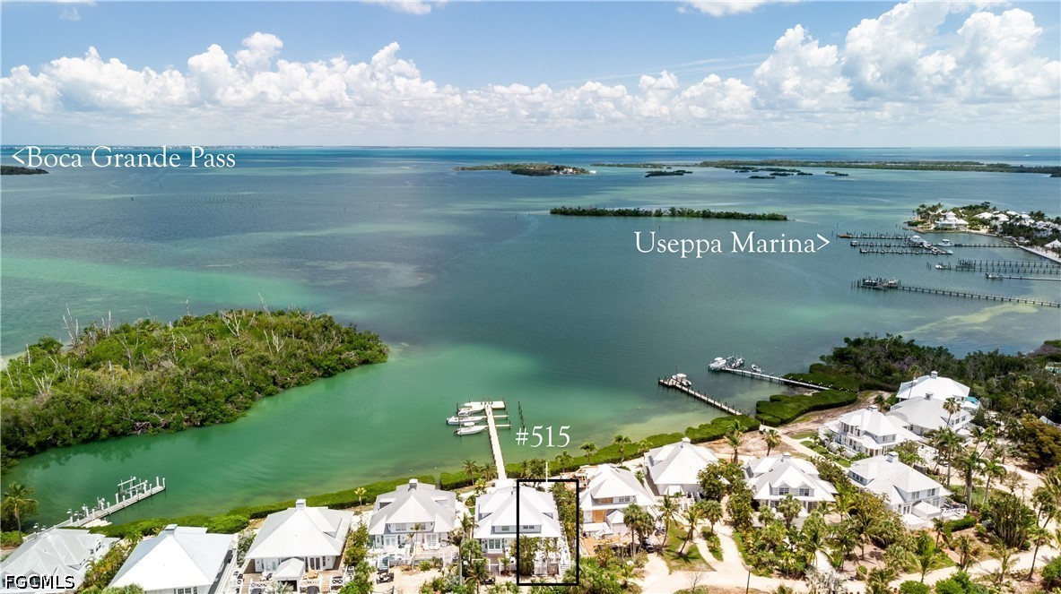 515 Useppa Useppa Island Bokeelia, FL 33922 - Photo 7 of 43 a view of a lake with a big yard