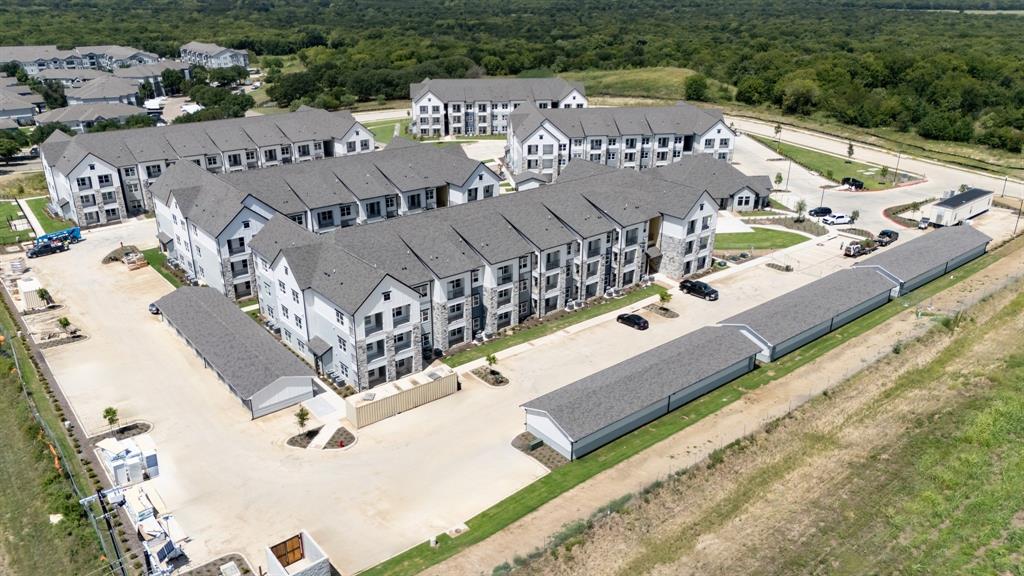 3900 Five Points Drive, Unit 2206 Kaufman, TX 75142 - Photo 1 of 3 a view of a balcony with chairs