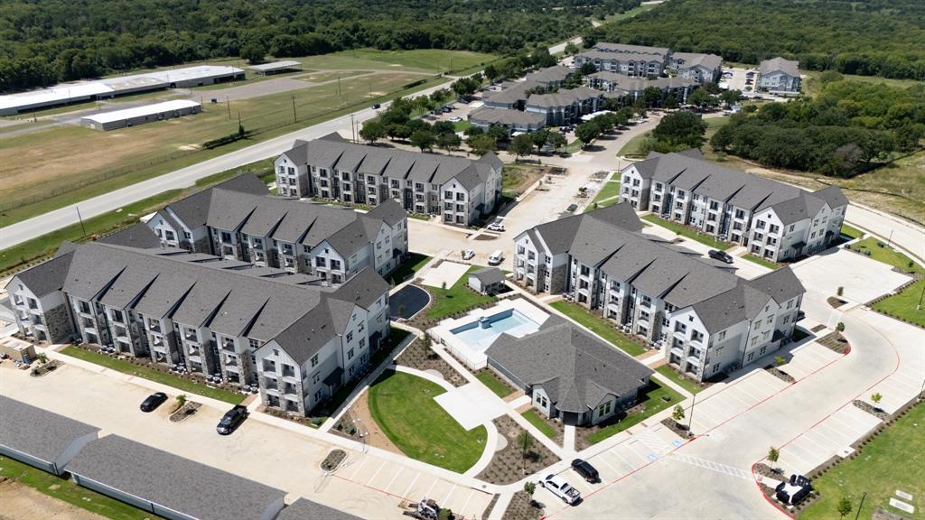 3900 Five Points Drive, Unit 2206 Kaufman, TX 75142 - Photo 2 of 3 an aerial view of a house with outdoor space