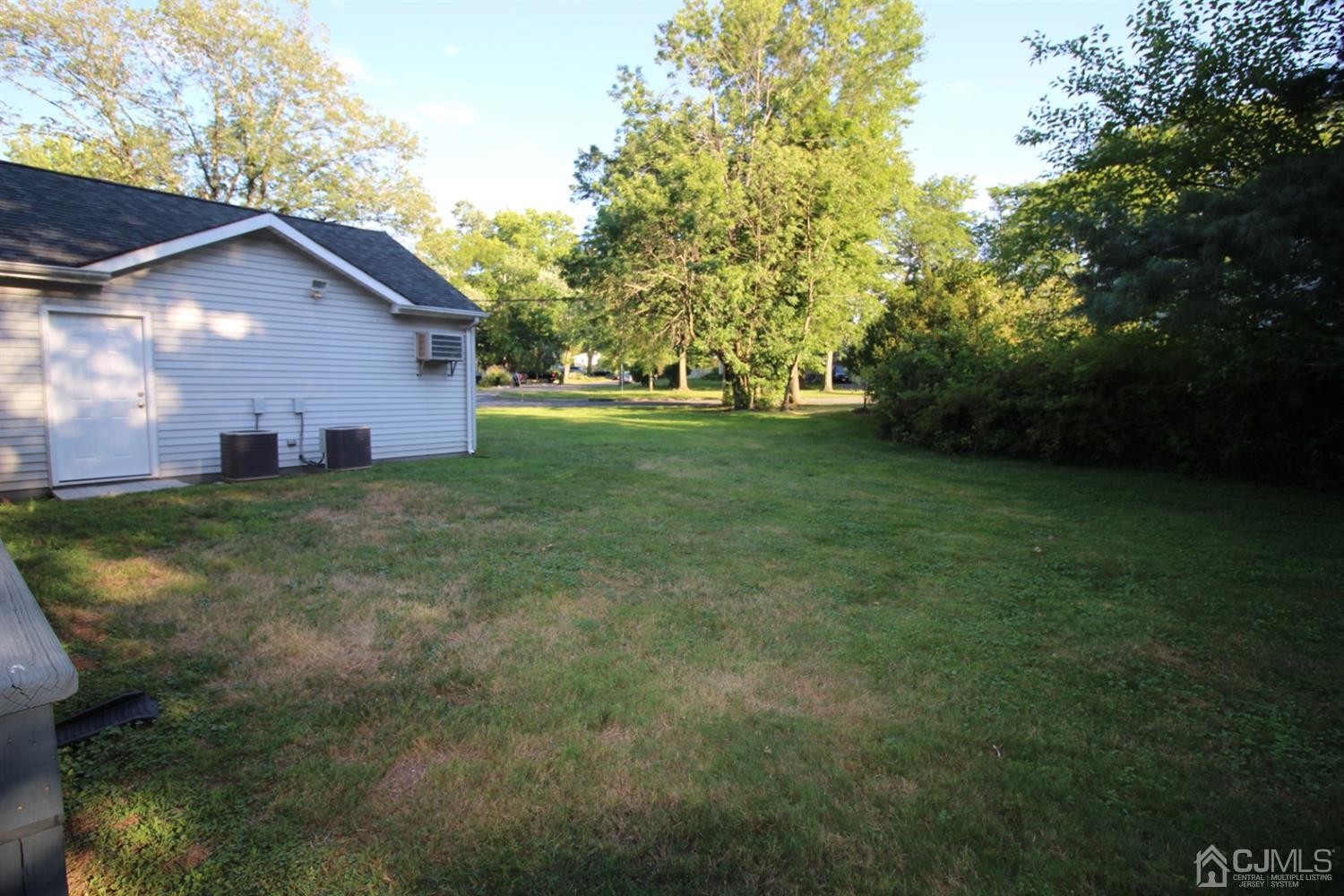 26 Homestead Road Edison, NJ 08820 - Photo 28 of 34 a view of a house with a yard