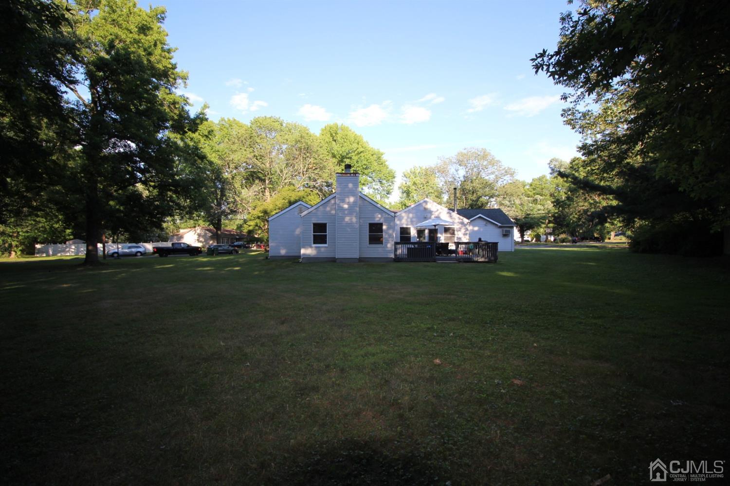 26 Homestead Road Edison, NJ 08820 - Photo 29 of 34 a view of a house with a big yard