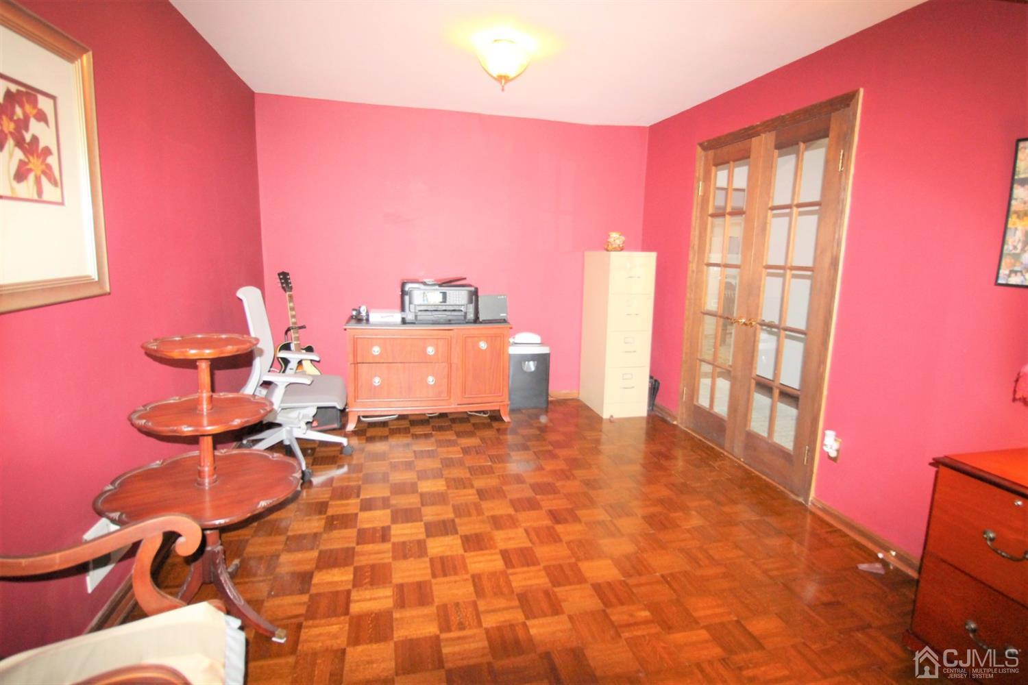 26 Homestead Road Edison, NJ 08820 - Photo 5 of 34 a view of a workspace with furniture and a window
