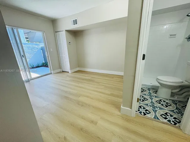 a view of a bathroom with a sink and a toilet