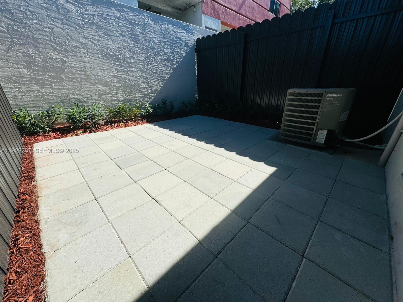 2940 West Flagler Street, Unit 4 Miami, FL 33135 - Photo 10 of 13 a view of outdoor space with wooden floor