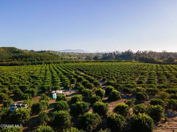 a view of an ocean and a mountain