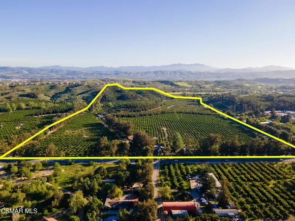 an aerial view of mountain with lake view