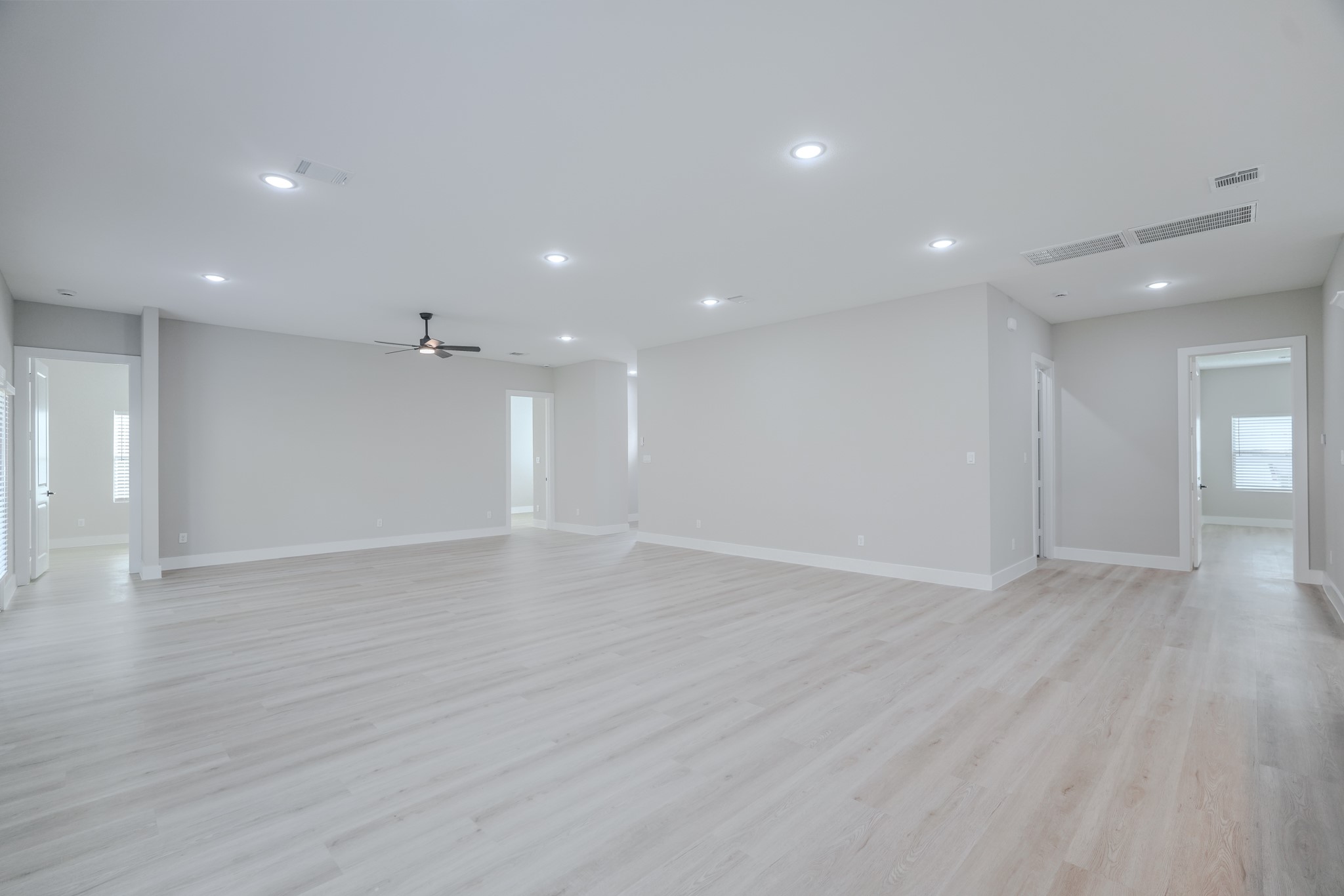 2618 Piemonte Avenue Cir Spring Spring, TX 77388 - Photo 14 of 50 a view of an empty room with wooden floor