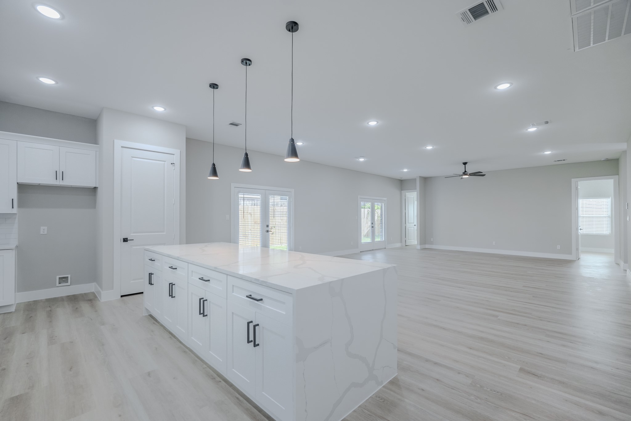 2618 Piemonte Avenue Cir Spring Spring, TX 77388 - Photo 19 of 50 a large kitchen with stainless steel appliances kitchen island a large island in the center