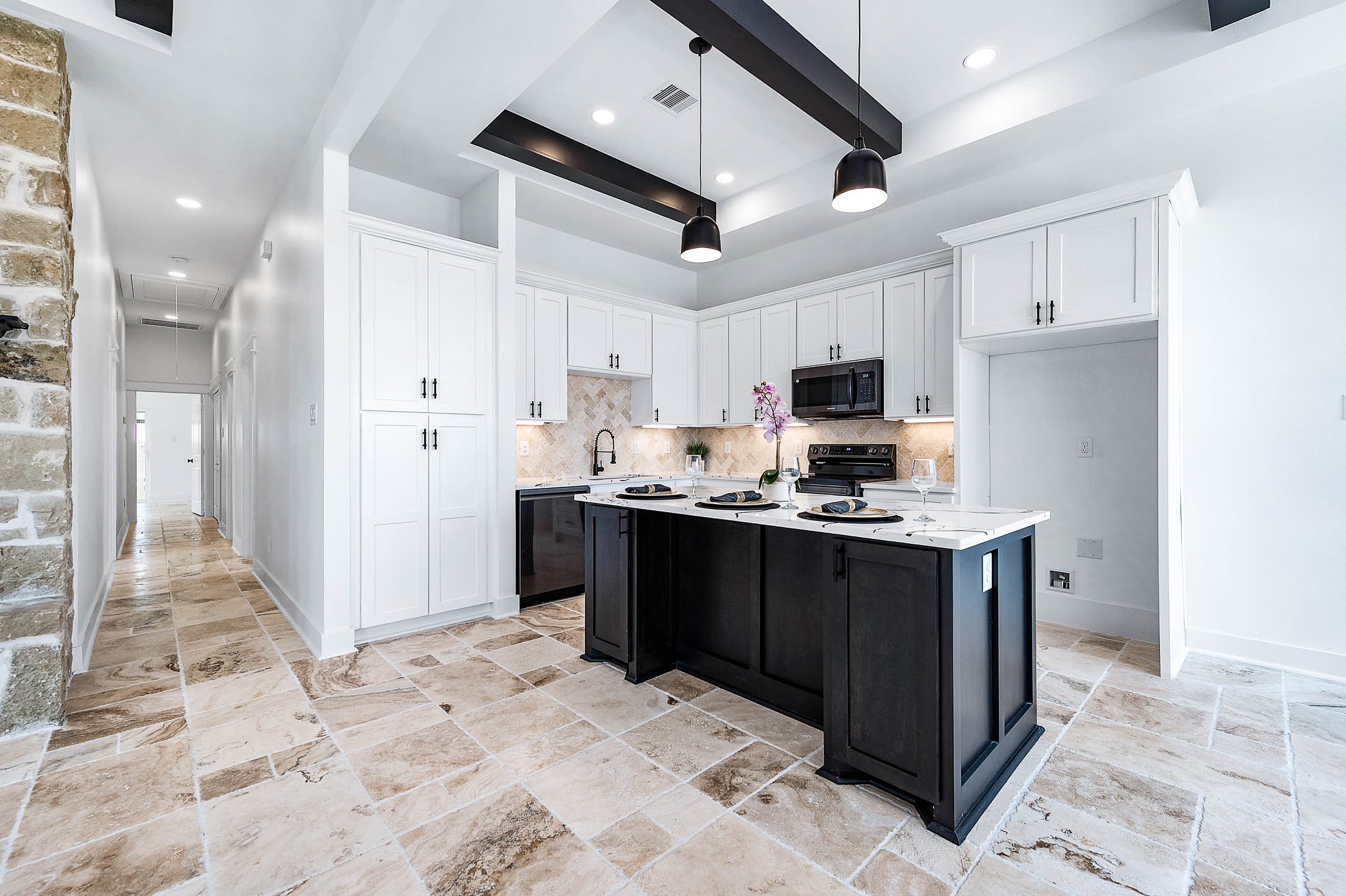 14120 Fm1236 Road Needville, TX 77461 - Photo 12 of 34 a kitchen with stainless steel appliances kitchen island granite countertop a refrigerator and a stove top oven