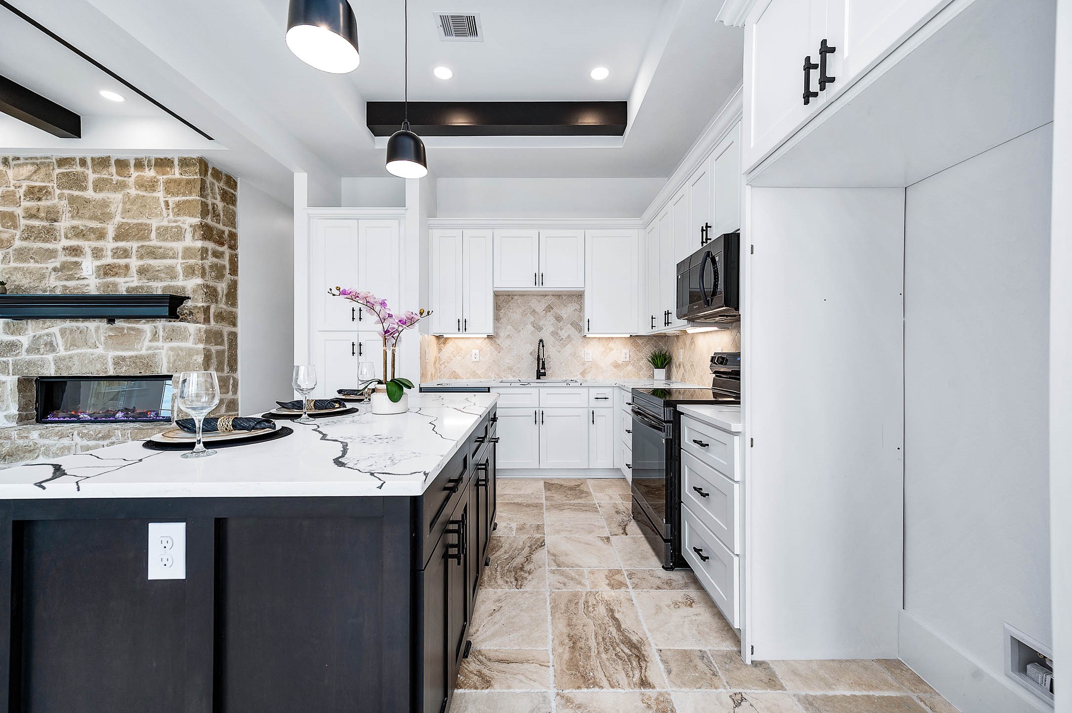 14120 Fm1236 Road Needville, TX 77461 - Photo 14 of 34 a kitchen with stainless steel appliances kitchen island granite countertop a refrigerator and a stove top oven