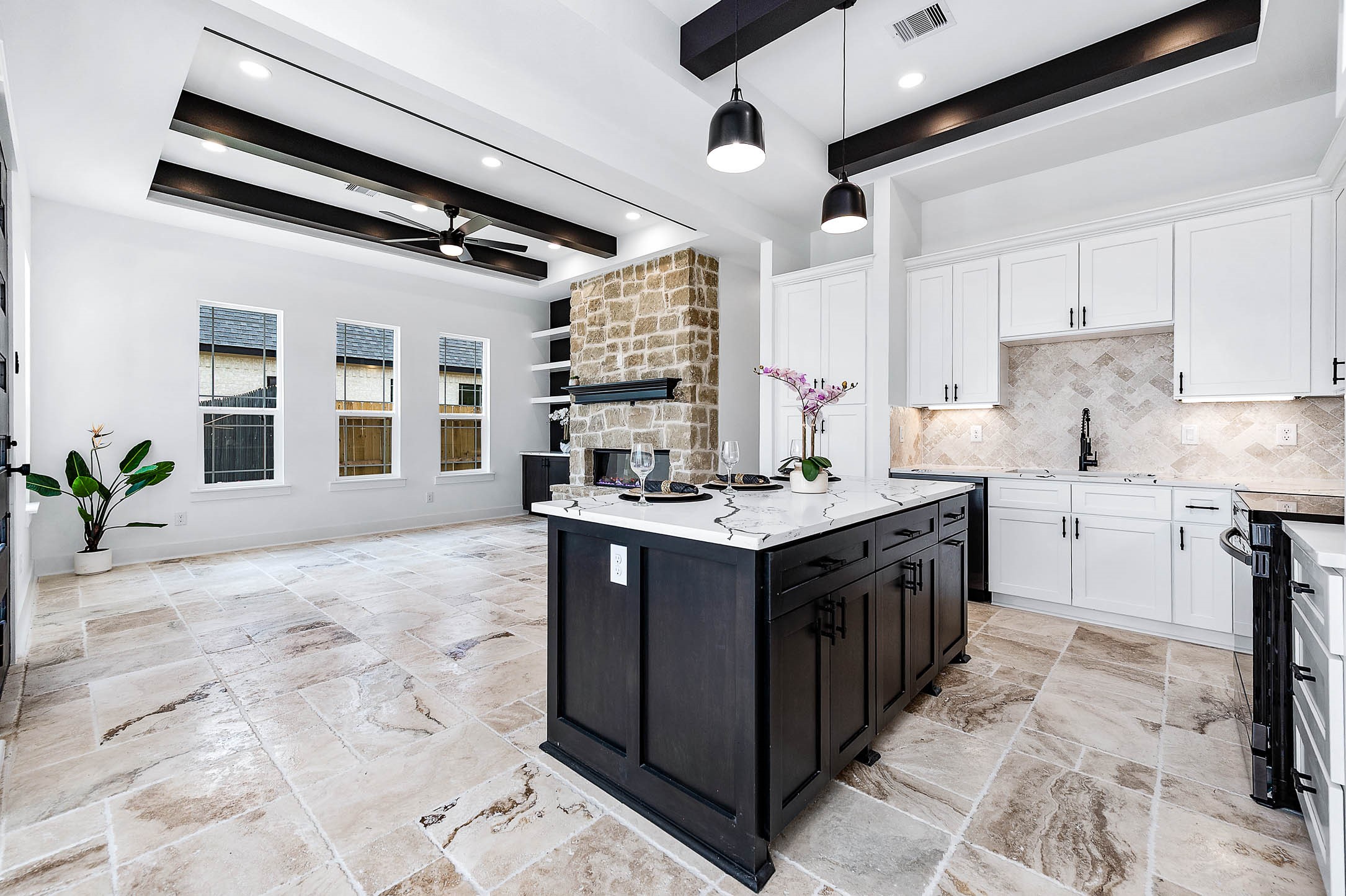 14120 Fm1236 Road Needville, TX 77461 - Photo 16 of 34 a kitchen with a sink stove and cabinets