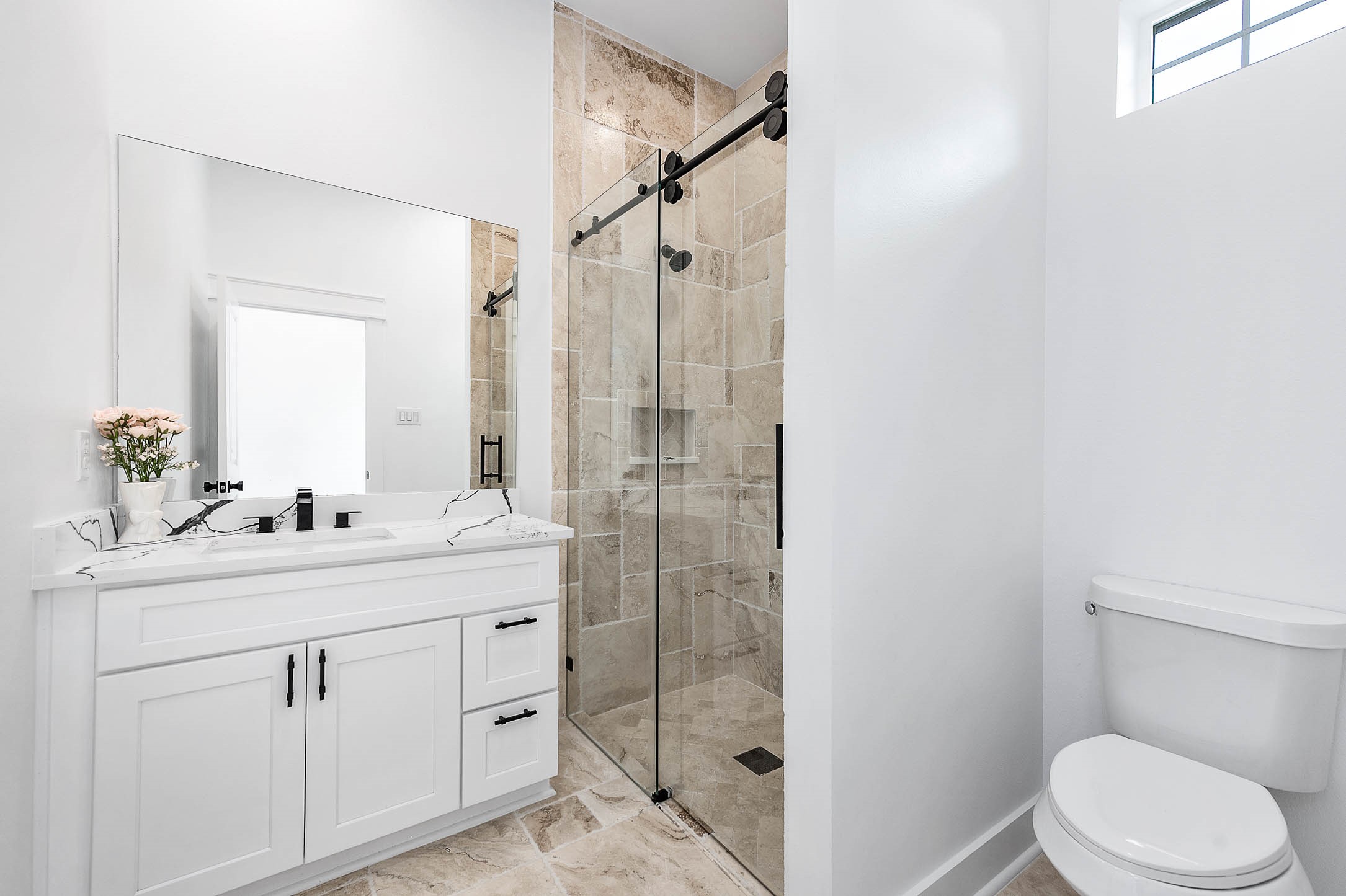 14120 Fm1236 Road Needville, TX 77461 - Photo 20 of 34 a bathroom with a sink toilet vanity and shower