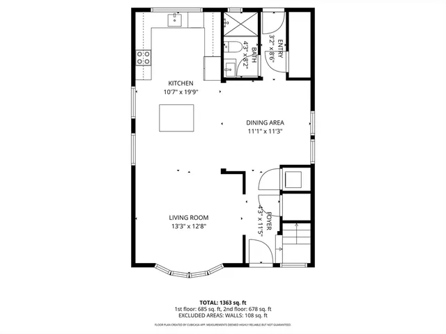 a picture of a building with a white fence