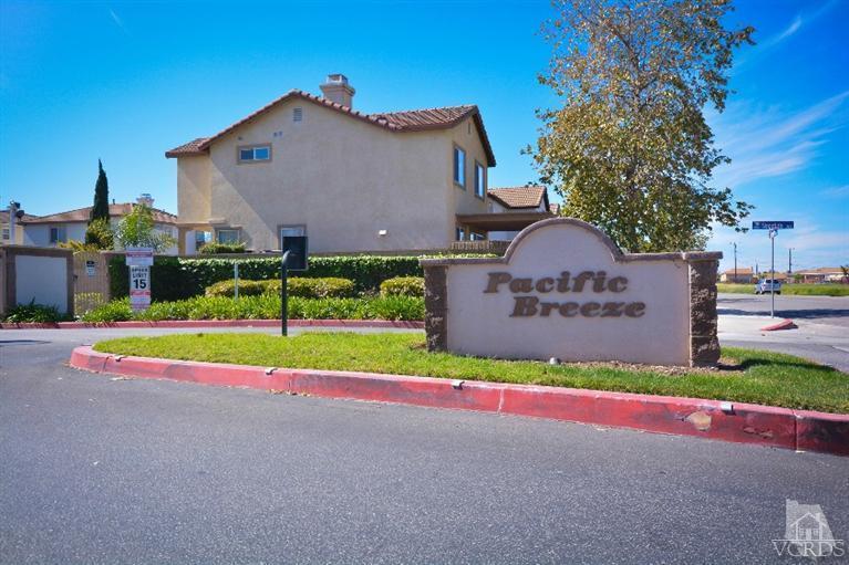 843 Pivot Point Way Oxnard, CA 93035 - Photo 2 of 21 a view of house with a big yard and large tree