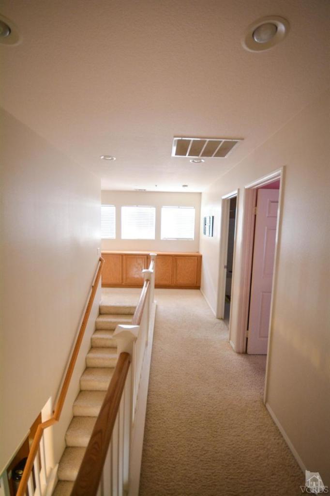 843 Pivot Point Way Oxnard, CA 93035 - Photo 8 of 21 a view of an empty room with wooden floor