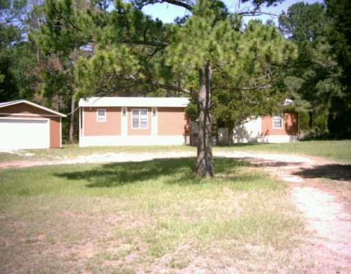 247 4 C Ranch Road Bastrop, TX 78602 - Photo 1 of 1 Exterior Front : Front of house