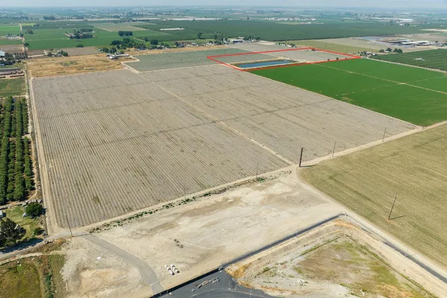 a view of a swimming pool and an outdoor space