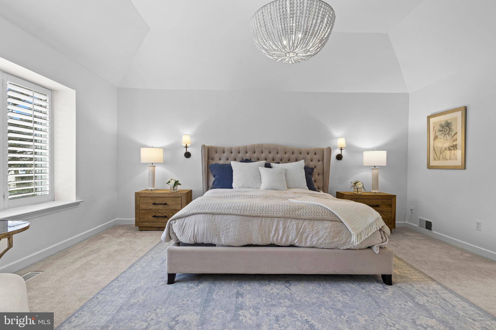 217 Ravenscliff Road Wayne, PA 19087 - Photo 47 of 64 Spacious primary with beautiful chandelier