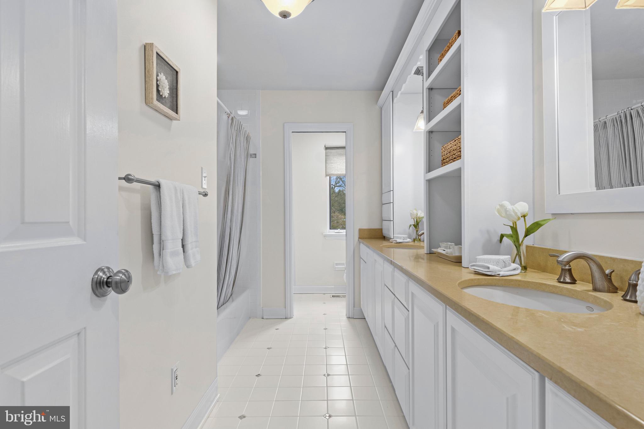 217 Ravenscliff Road Wayne, PA 19087 - Photo 56 of 64 Beautiful tile floor and tub surround